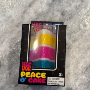 Peace O' Cake Kids Stress Toy - White, Yellow, Pink, Blue